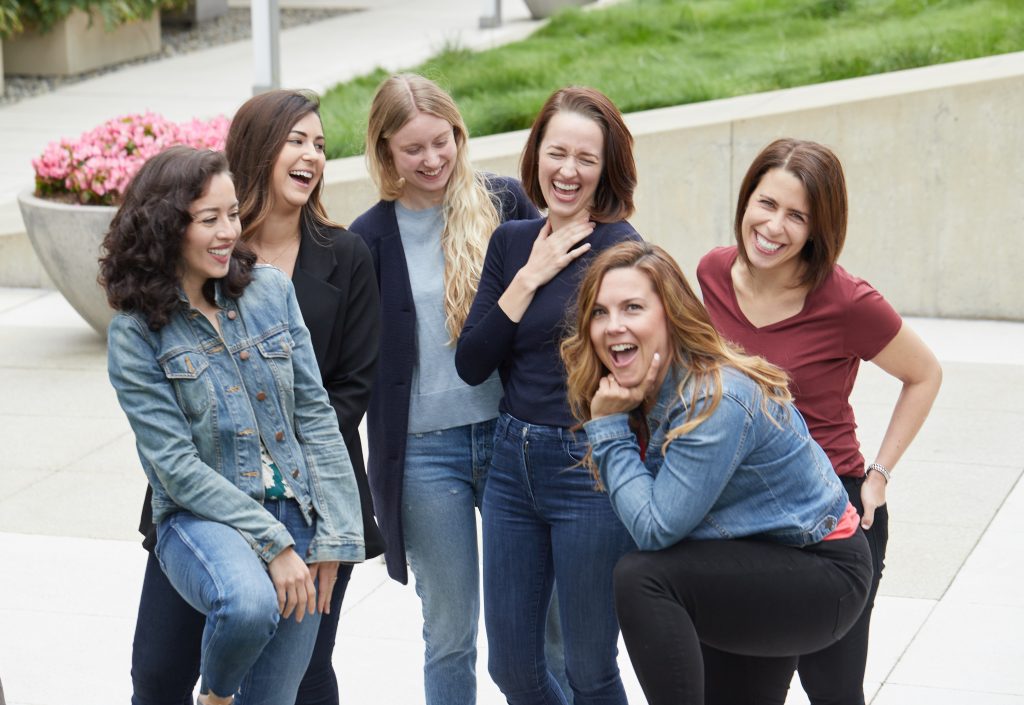 Image Description: A group of Practically Perfect organizers laugh and smile at the camera