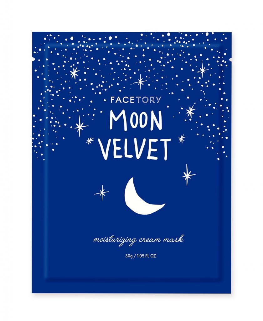 Image Description: A blue face mask package labeled "Moon Velvet" against a white background