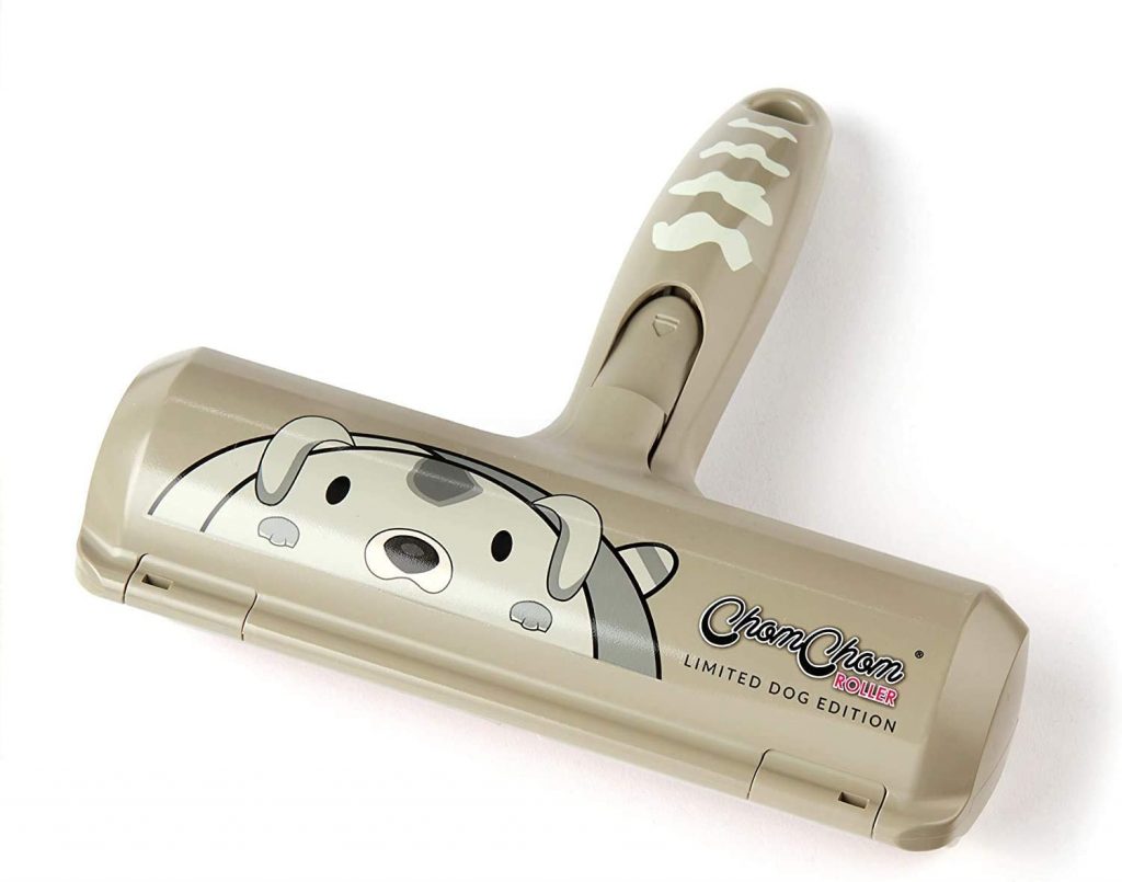 Image Description: A handheld pet roller with a cartoon dog, against a white background